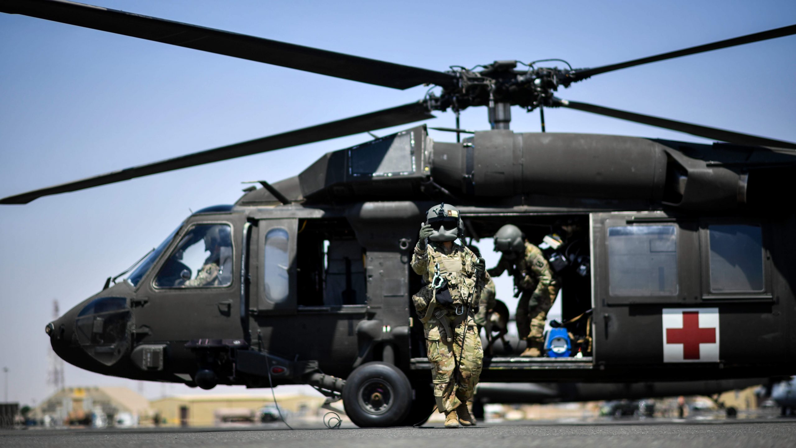 Medical evacuation helicopter with personnel at the open cabin door