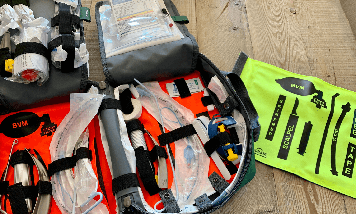 Yellow MERT surgical-airway panel beside the open bag