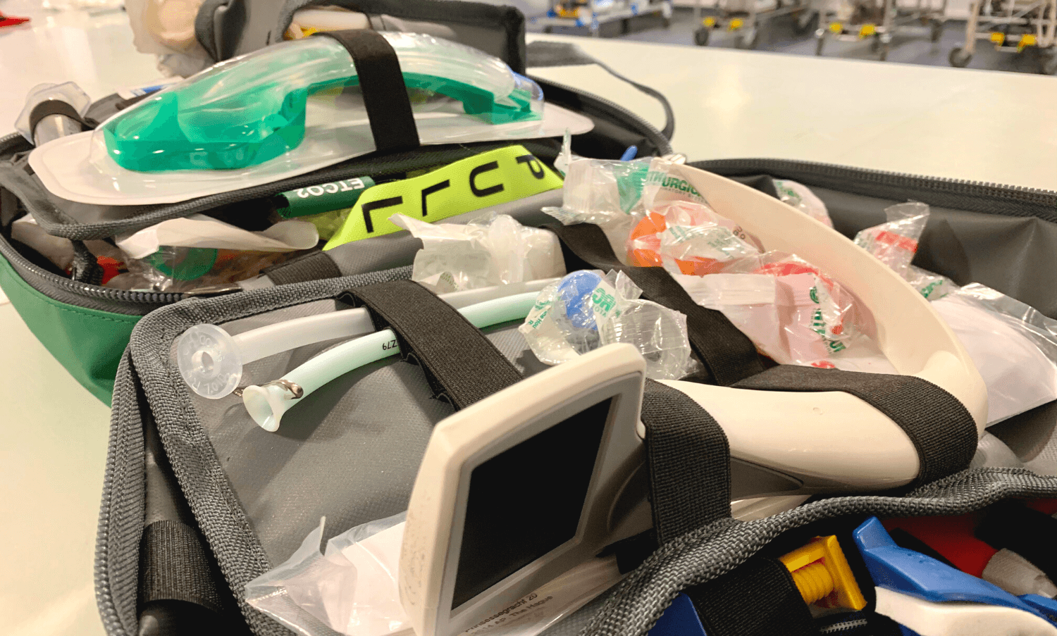 Stocked bag with a video-laryngoscope screen